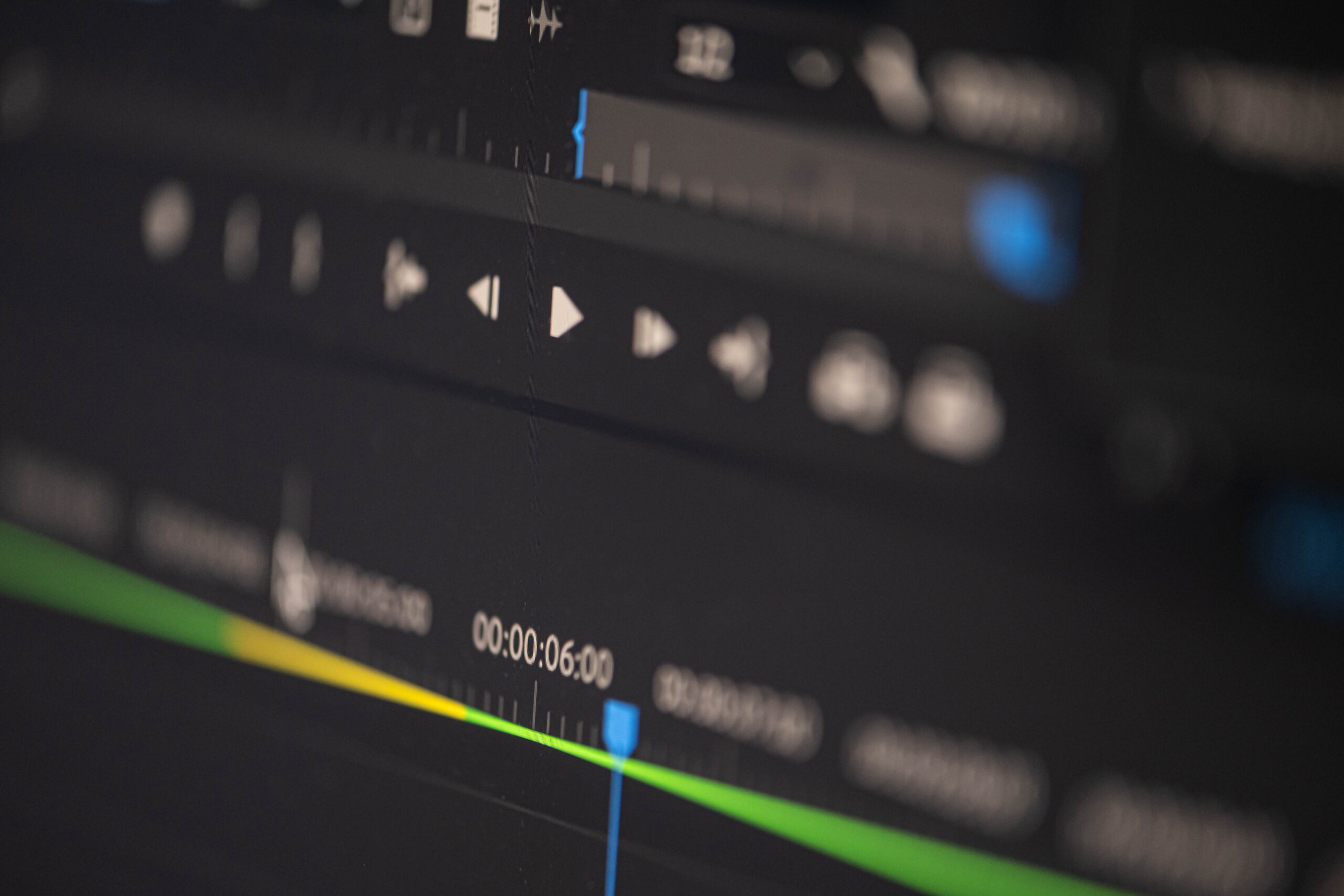 Close-up of a video editing software interface showing a time line with various controls and tracks.